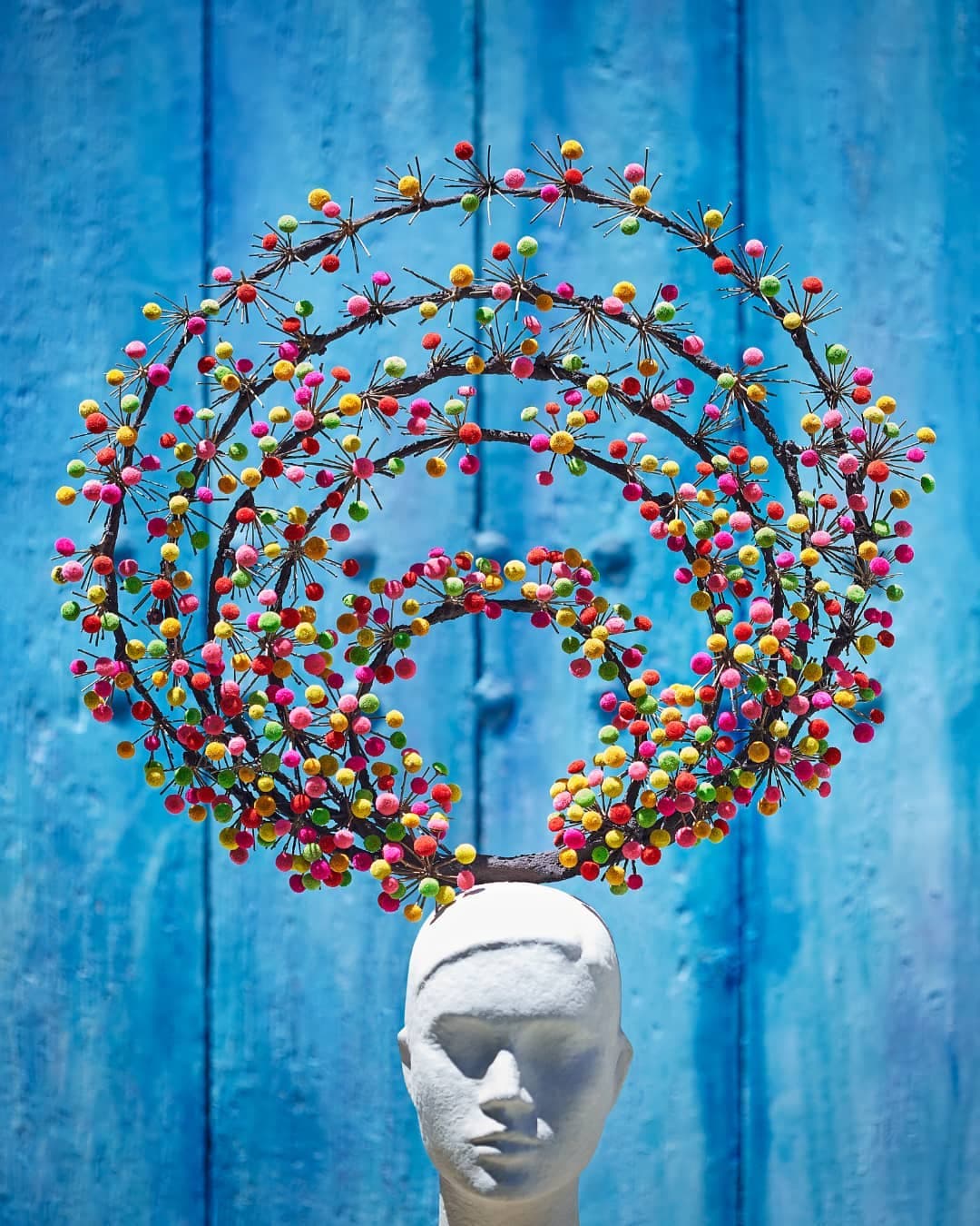 Colourful botanical head sculpture created by Bet